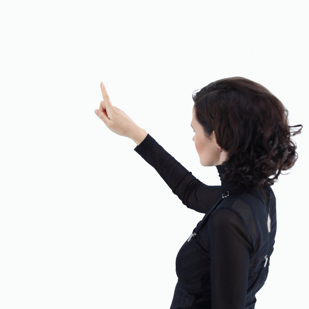 女商人把手指按在一个想象的按钮上图片下载