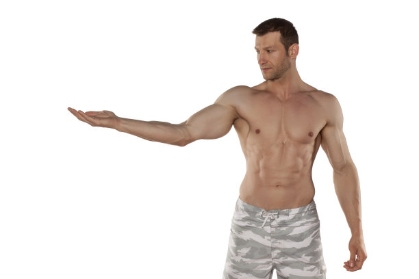 半裸的英俊和肌肉的年轻人抱着想象的对象在一个白色的背景图片下载