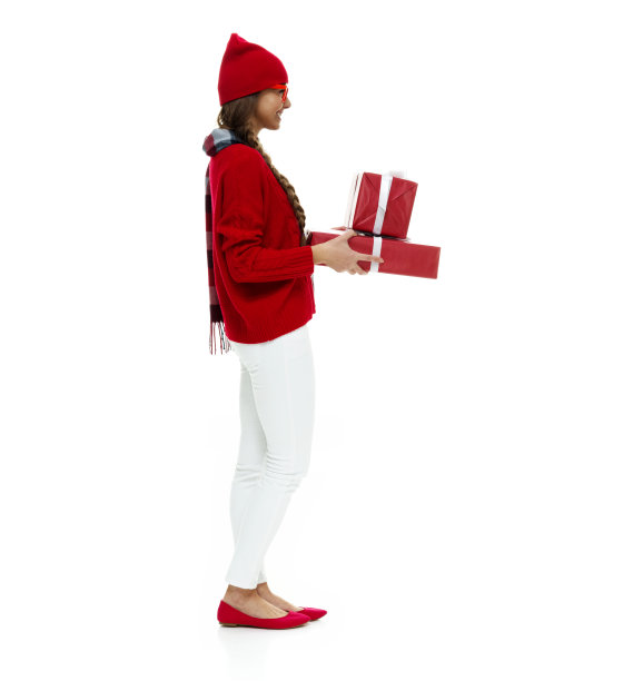 白人女性站在白色背景前戴着眼镜和拿着盒子图片下载