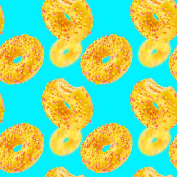 蓝色背景上的甜甜圈无缝纹理或图案。图片下载