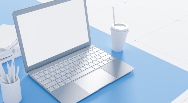 灰色笔记本电脑与白色空白模型屏幕上的蓝色和白色背景图片下载
