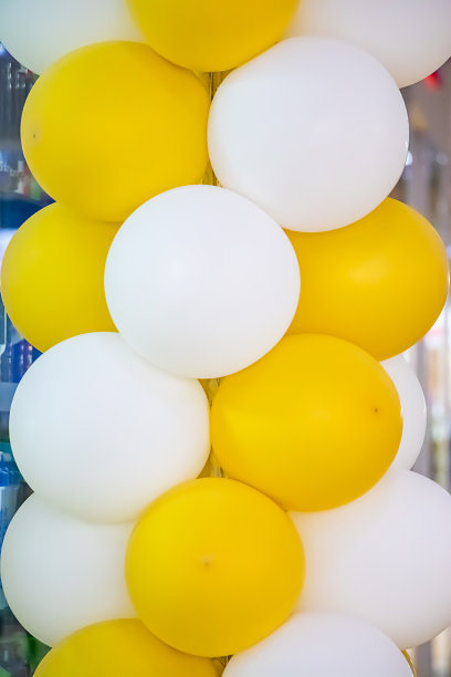 装饰用的漂亮的黄白色气球图片下载