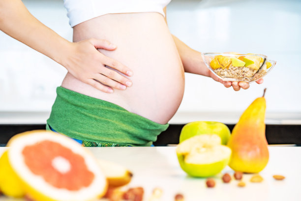 孕妇做饭。图片下载