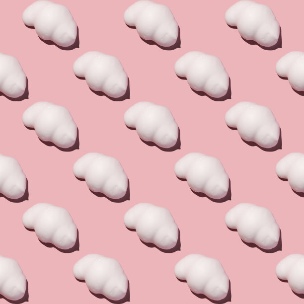 无缝图案的化妆品泡沫粉红色的背景。图片下载