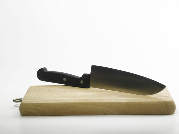 菜刀放在切菜板上图片下载