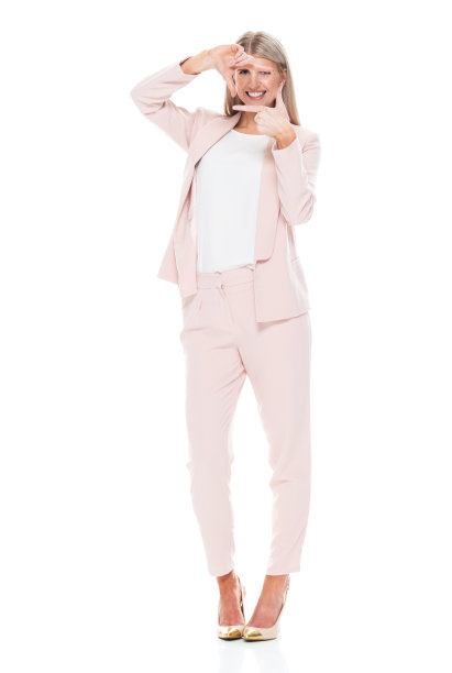 白人女商人站在白色的背景下穿着漂亮的休闲图片下载