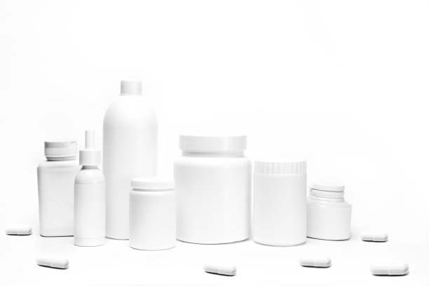 白色背景上的药丸罐图片下载