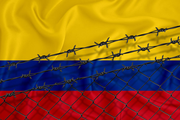 发展哥伦比亚旗、铁丝网、铁丝网。移民孤立的概念。为你的文本。图片下载