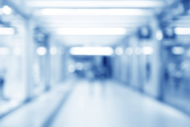 抽象模糊的走廊诊所内部背景在蓝色，模糊图像图片下载