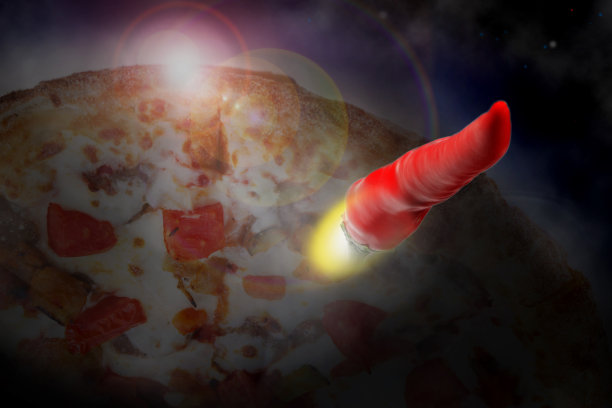 快速交付的概念。红辣椒像火箭一样从比萨星球出发。图片下载