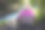 沉思的女人坐在瀑布/溪流附近图片下载