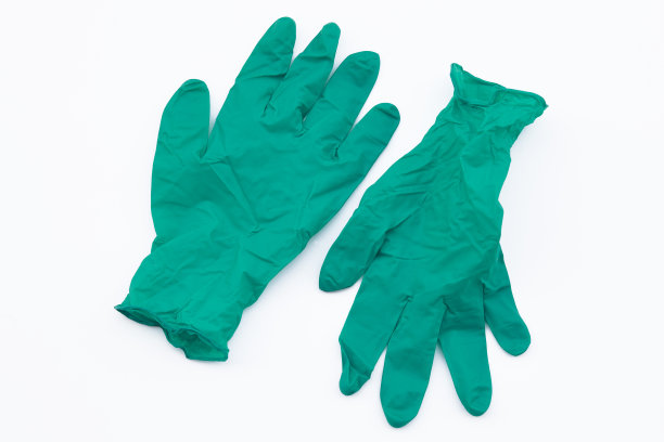 Covid-19一次性污染手套。冠状病毒乳胶塑料垃圾图片下载