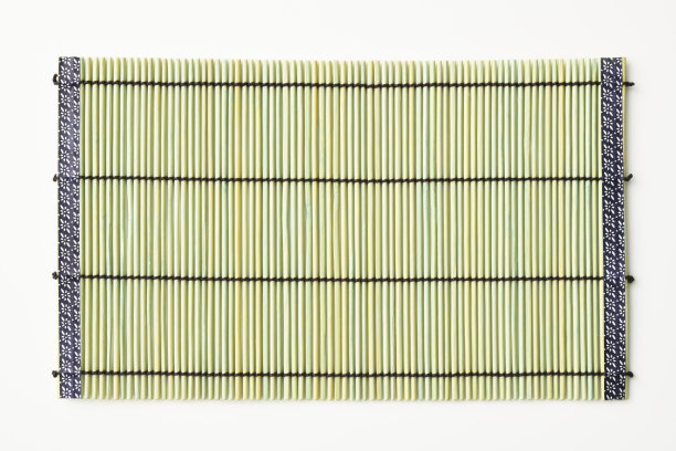 白色背景上的竹席孤立的镜头图片下载