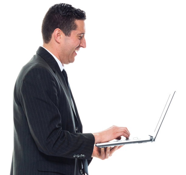 白人年轻男性商人穿着商务装站在白色背景前使用电脑图片下载