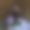雕刻的木制雕像的侏儒与灯笼休息在花岗岩石头图片下载