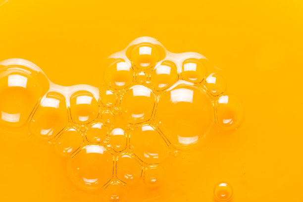 黄油中的气泡。化妆品洗发水的质地。图片下载