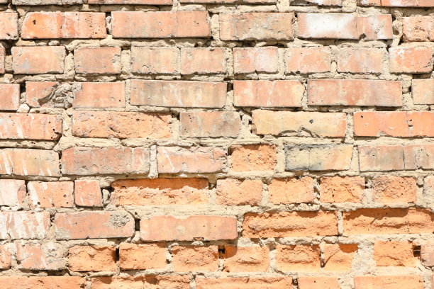 旧风化砖墙碎片。图片下载