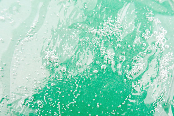 纹理背景与透明质酸气泡。化妆品和皮肤护理。油麻。图片下载