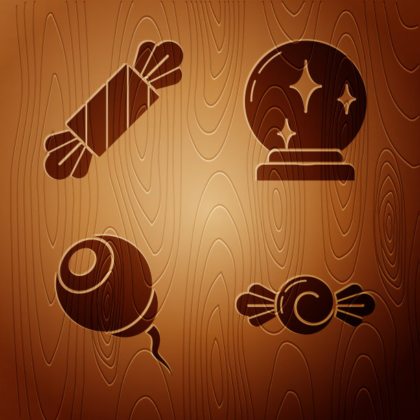 把糖果眼和魔术球放在木头上图片下载