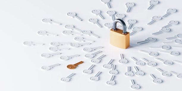 钥匙散落在挂锁上图片下载