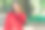 图片中可爱的黑发女孩抚摸着她的脖子，在模糊的公园背景下看起来天真而真诚。图片下载