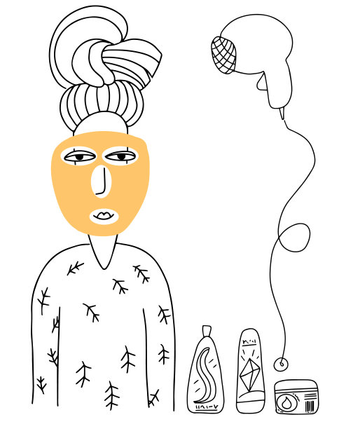 妇女敷面膜，并照顾头发和脸部图片下载