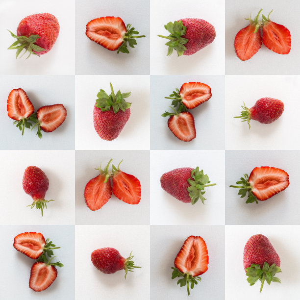 整个和切熟的红草莓放在棋盘背景上。模式图片下载