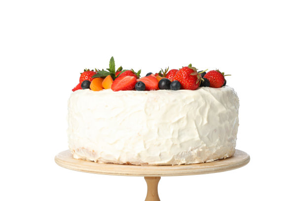 木架子上的浆果奶油蛋糕被孤立在白色的背景上图片下载