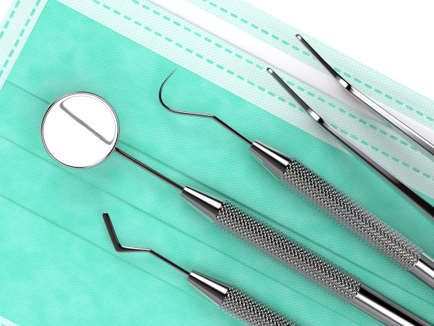 3d渲染牙科诊断仪器躺在防护口罩上图片下载