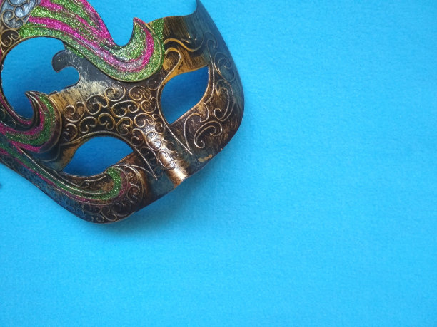 蓝色背景的节日面具图片下载