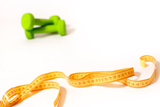 厘米胶带，绿色哑铃白色背景，文字空白。图片下载