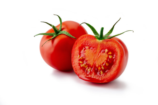 一个番茄和一个切片的番茄。图片下载