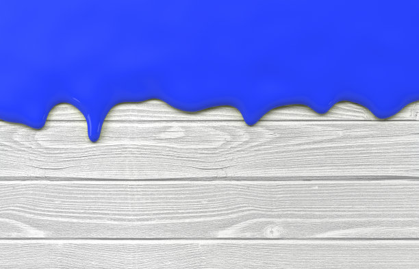 抽象的彩色液体在纹理背景前流动图片下载