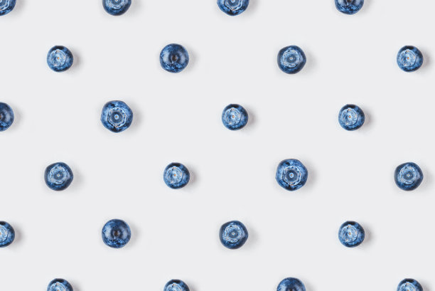 灰色背景上的新鲜蓝莓。图片下载