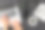 头顶上的男性商人的手使用笔记本电脑在抽象的黑色办公桌上，咖啡和眼镜图片下载