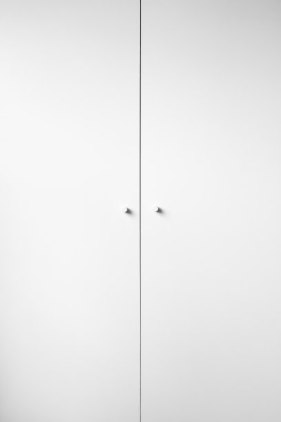 白色衣柜的门与白色把手的背景图片下载