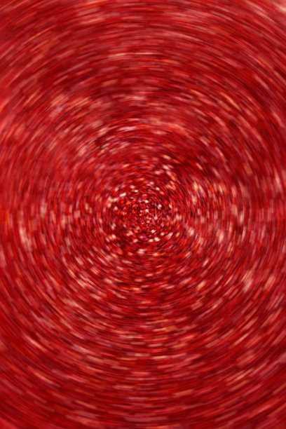 壁纸手机闪闪发光。红色闪亮模糊的背景。软的焦点。闪亮的红色散焦表面。闪亮闪亮的纹理。抽象闪烁的节日背景。图片下载