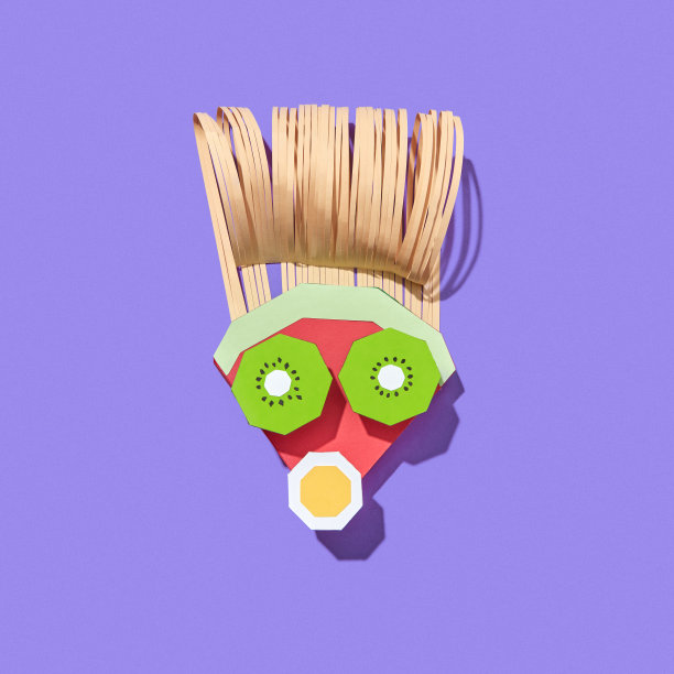 由五颜六色的水果片制成的纸面。图片下载