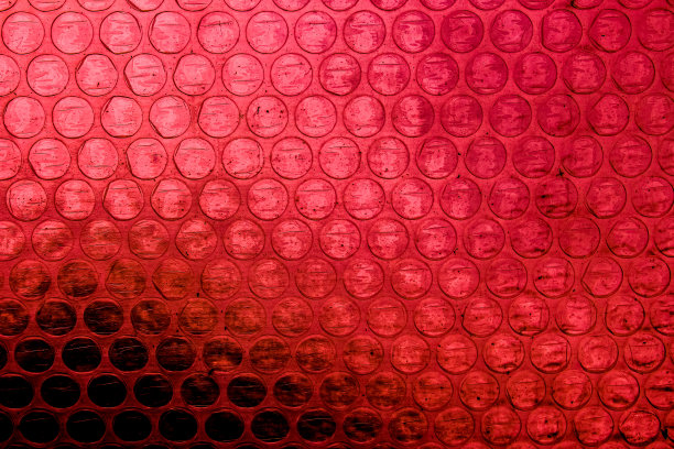 用于背景的红色塑料气泡膜纹理图片下载