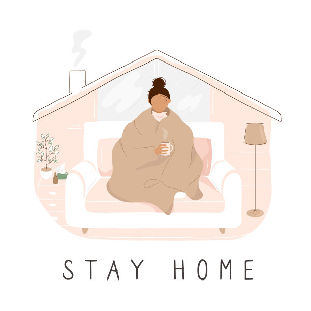 一个女人裹着毯子坐在沙发上，拿着杯子图片下载