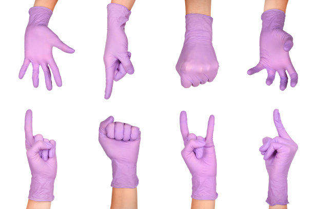 在紫色一次性乳胶外科手套孤立在白色背景上的手势集。图片下载