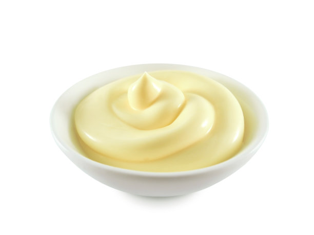 蛋黄酱或奶油在碗里单独旋转图片下载