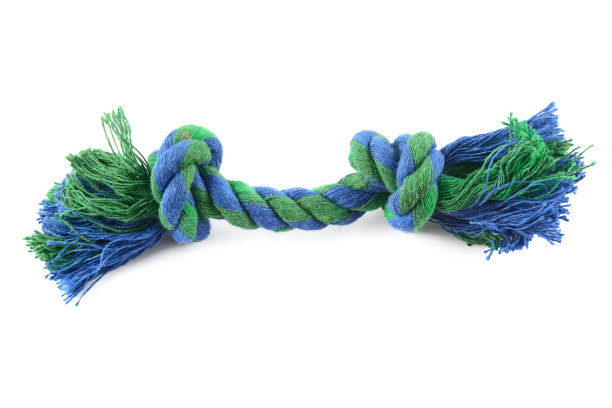 狗玩具-彩色棉绳游戏，孤立在白色背景。图片下载