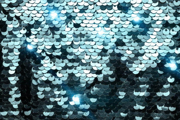 亮片孤立。美人鱼闪闪发光的织物质地。多彩的美人鱼亮片女人。图片下载