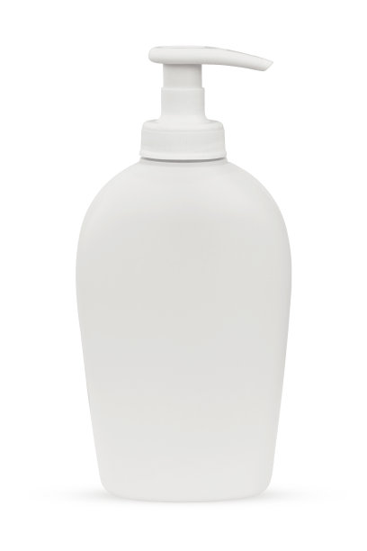 白色塑料瓶与分配器隔离在白色背景。图片下载