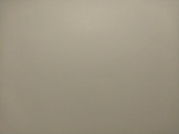 一张米色的纸，在左下角有一个背光图片下载