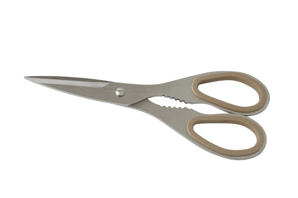 厨房里的不锈钢剪刀合拢，以白色为背景图片下载