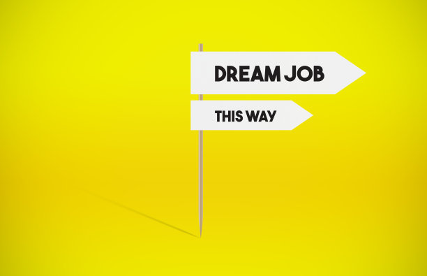 黄色背景上的理想工作箭头招牌图片下载