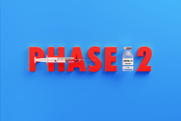 COVID-19疫苗和第二阶段蓝色背景文字图片下载