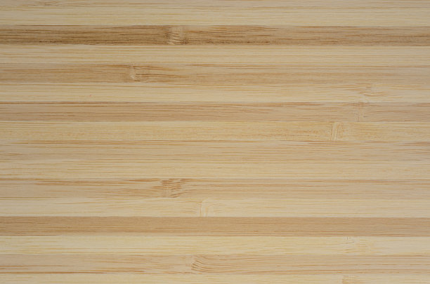 表面纹理由竹板组装而成。背景的一个木制砧板。图片下载